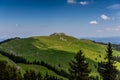 Green landscape of Rarau Mountains on a sunny day, Romania Royalty Free Stock Photo