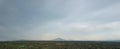 Green landscape with volcano mountains