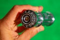 green laser light chrome metal flashlight front Royalty Free Stock Photo