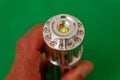 green laser light chrome metal flashlight front Royalty Free Stock Photo