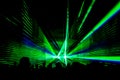 Green laser show nightlife club stage with party people crowd Royalty Free Stock Photo