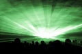 Green laser show nightlife club stage with party people crowd Royalty Free Stock Photo