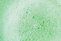 Green lather background, top view Royalty Free Stock Photo