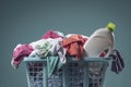 Green laundry detergent and laundry basket