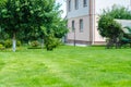 Green lawn backyard garden house Royalty Free Stock Photo