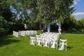 Green lawn with chairs for a ceremony Royalty Free Stock Photo