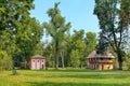Green lawns among trees in Racconigi Park, Italy. Royalty Free Stock Photo