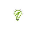 Green leaf with light bulb energy saving logo design. Royalty Free Stock Photo