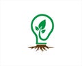 Green leaf with light bulb energy saving logo design. Royalty Free Stock Photo