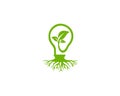 Green leaf with light bulb energy saving logo design. Royalty Free Stock Photo