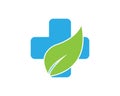 Green Leaf Medical Cross Logo Vector Icon. Royalty Free Stock Photo