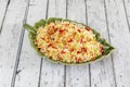 Green leaf shaped porcelain tray with Hindu pilau rice