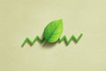 Green Leaf on Zigzag Arrow Reflecting Eco Growth and Sustainability Trends. Royalty Free Stock Photo