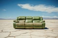 Green leather reclining sofa in desert environment