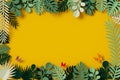 Green Leaves are framed on yellow background, Butterfly paper fly, 3d rendering, with clipping path. Royalty Free Stock Photo