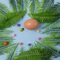 Green leaves surrounded the mushrooms, ladybugs and eggs. Everything is on a light blue background. Minimalistic nature scene Royalty Free Stock Photo