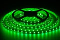 Green LED strip on reel with black background Royalty Free Stock Photo