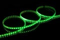 Green LED strip tape on black background Royalty Free Stock Photo