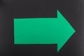 Green left right direction blank paper arrow with space for text on black background Royalty Free Stock Photo