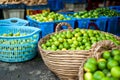 Green lemond on baskets Royalty Free Stock Photo