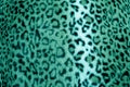 Green leopard animal print fur pattern - fabric Royalty Free Stock Photo