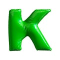 Green letter K made of inflatable balloon isolated on white background