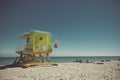 Green lifeguard cabin on the beach on a sunny day