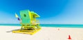 Green lifeguard tower in Miami Beach on a clear day