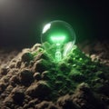 Green light bulb growing out of a mound of soil save environment