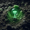 Green light bulb growing out of a mound of soil save environment