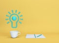 Green light bulb idea teacup among workset outstanding yellow background. Minimal concept.