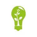Green light bulb with tree plant inside Royalty Free Stock Photo