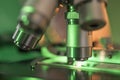 Green Light Falling On Microscope Lens Royalty Free Stock Photo