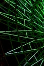 Green light fluorescent on structure of ferris wheel with dark night background Royalty Free Stock Photo