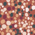 Green, light and maroon rocks simple silhouettes seamless pattern. Doodle masonry print with dark orange background Royalty Free Stock Photo