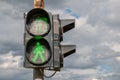 Green light at traffic lights for pedestrians.