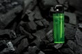 The green lighter On a black background with charcoa Royalty Free Stock Photo