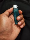 Green lighter hand background black