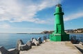 A green lighthouse