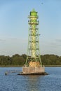 Green lighthouse colonized by cormorants Szczecin lagoon Royalty Free Stock Photo