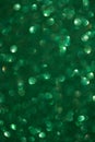 Green Lights Festive background with texture. Abstract Christmas twinkled bright bokeh defocused and Falling stars Royalty Free Stock Photo