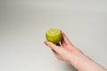 Green lime in a Female hand Royalty Free Stock Photo