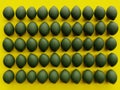 Green Lime grouped viewed from above with vibrant Yellow background in minimalism flatlay with copyspace Royalty Free Stock Photo