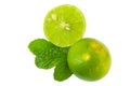 Green lime half and mint leaf on white background Royalty Free Stock Photo