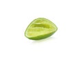 Green lime on isolated white background. A half piece of squeezed lemon for seasoning. Clipping path or cutout object for