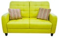 Green lime sofa with pillow. Soft lemon couch. Classic pistachio divan on isolated background Royalty Free Stock Photo