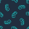 Green line Socks icon isolated seamless pattern on blue background. Vector Royalty Free Stock Photo