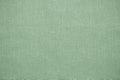 Green linen pastel fabric, background or texture