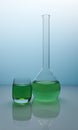 Green Liquid Inside Glass Retort - Photo with Blue Gradient Background