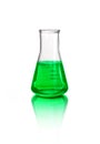 Green liquid in laboratory glassware, isolated on white Royalty Free Stock Photo